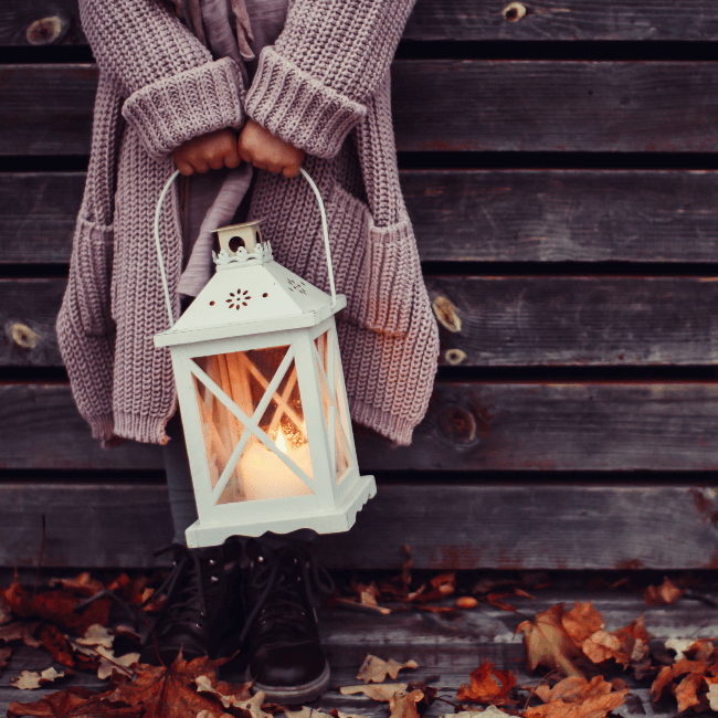 girl holding white lantern